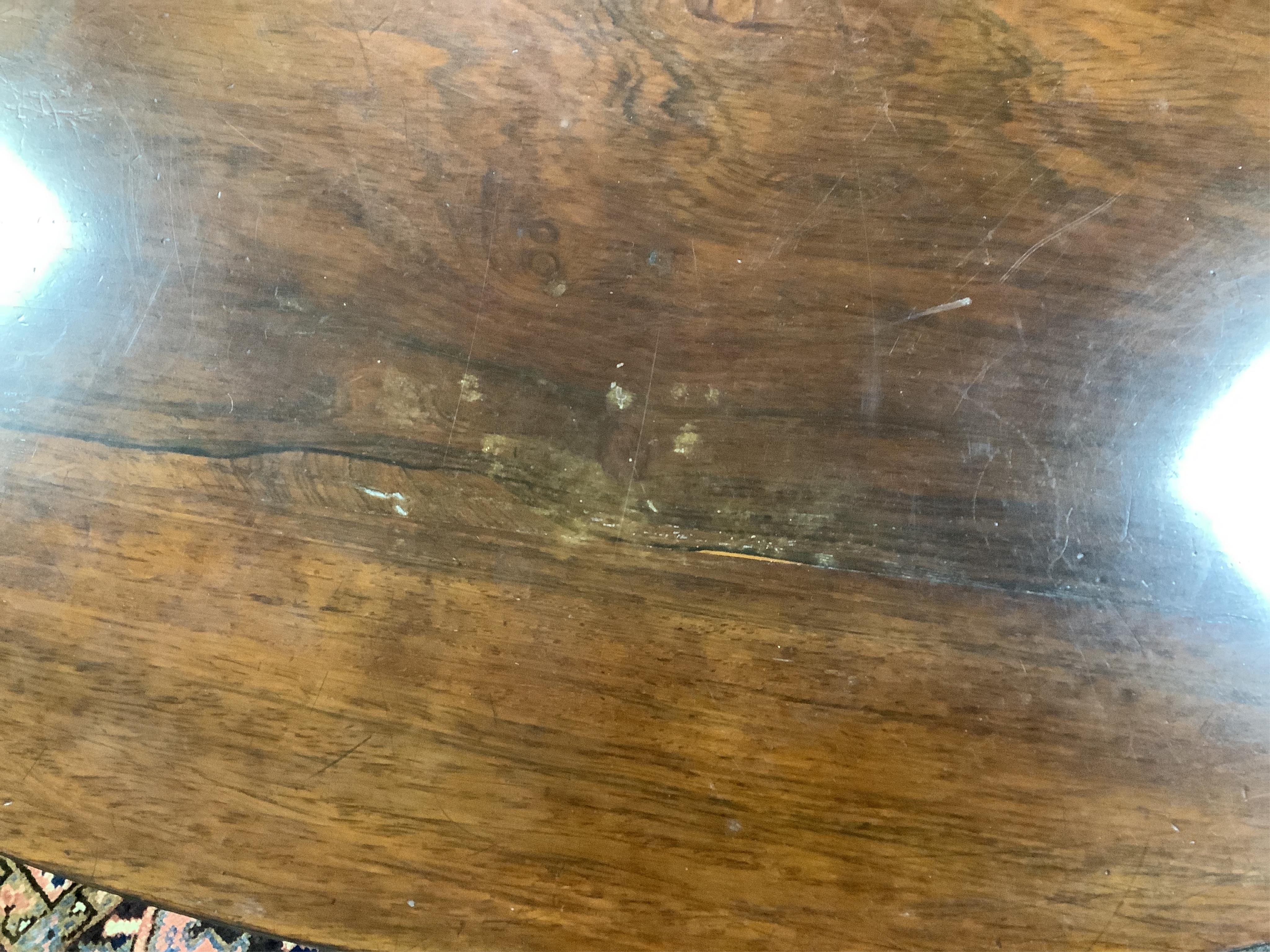 An early Victorian circular rosewood tilt top breakfast table, diameter 128cm, height 72cm